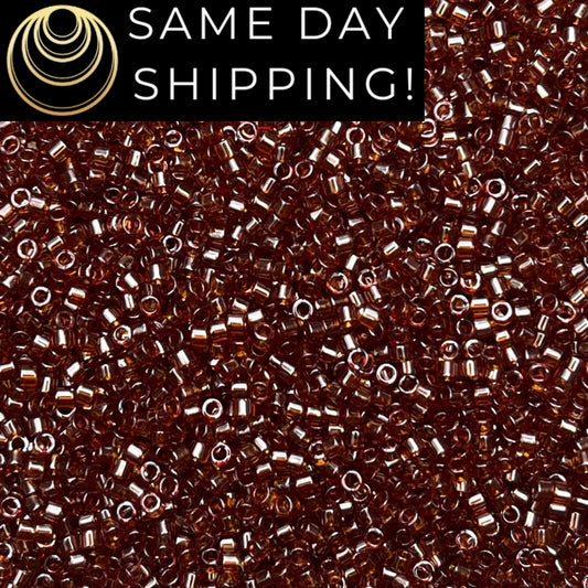 DB1891 (1 gram-20 grams) Miyuki Size 11/0 Delica Beads Transparent Dark Topaz Luster-Free Container! Same Day Shipping!