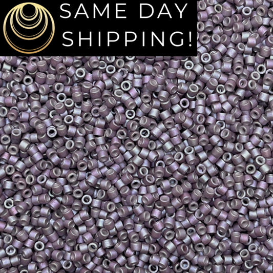 DB1065 (1 gram-20 grams) Miyuki Size 11/0 Delica Beads Metallic Wisteria Gold Iris-Free Container! Same Day Shipping!