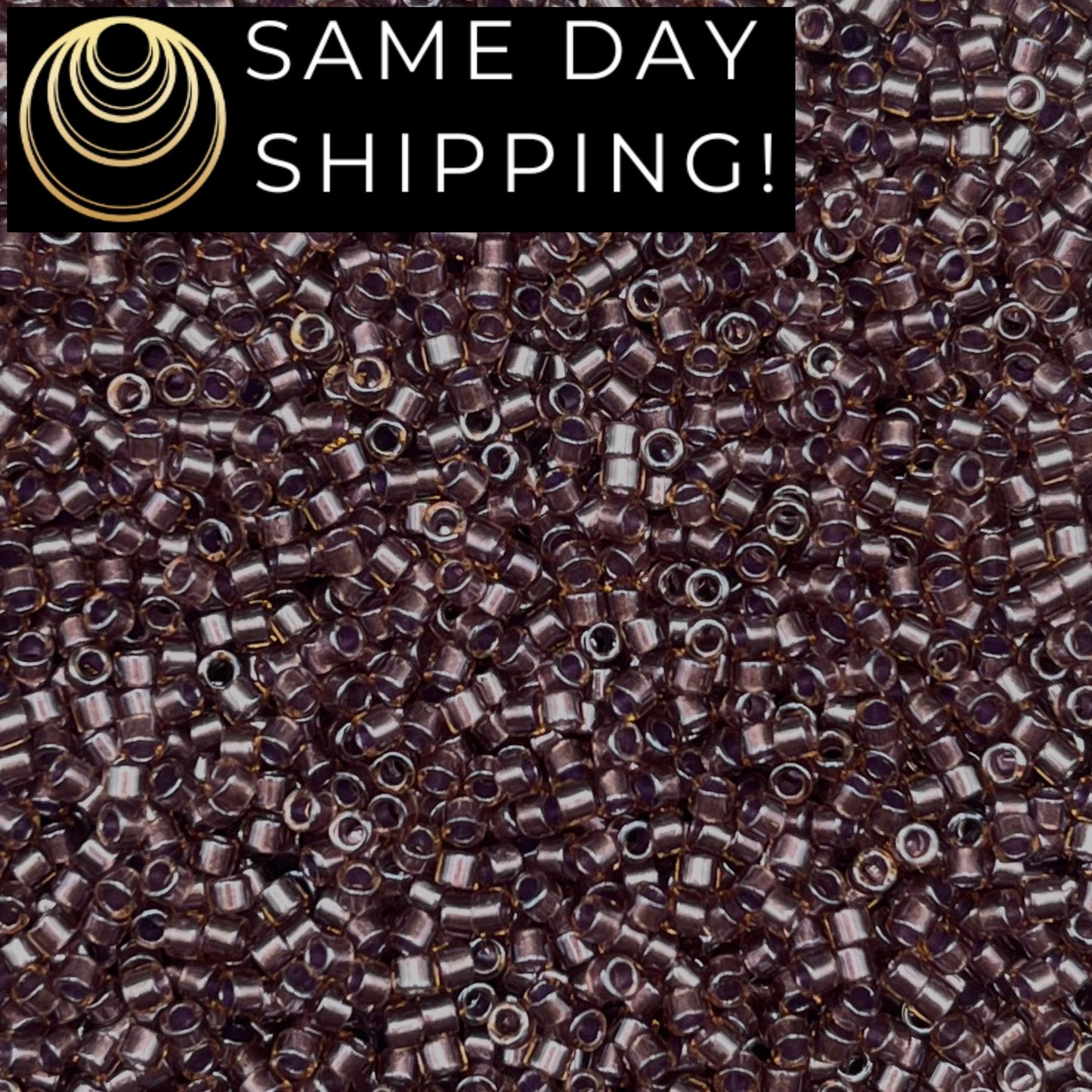 DB0912 11/0 Miyuki Delica Beads Sparkling Cinnamon Lined Topaz