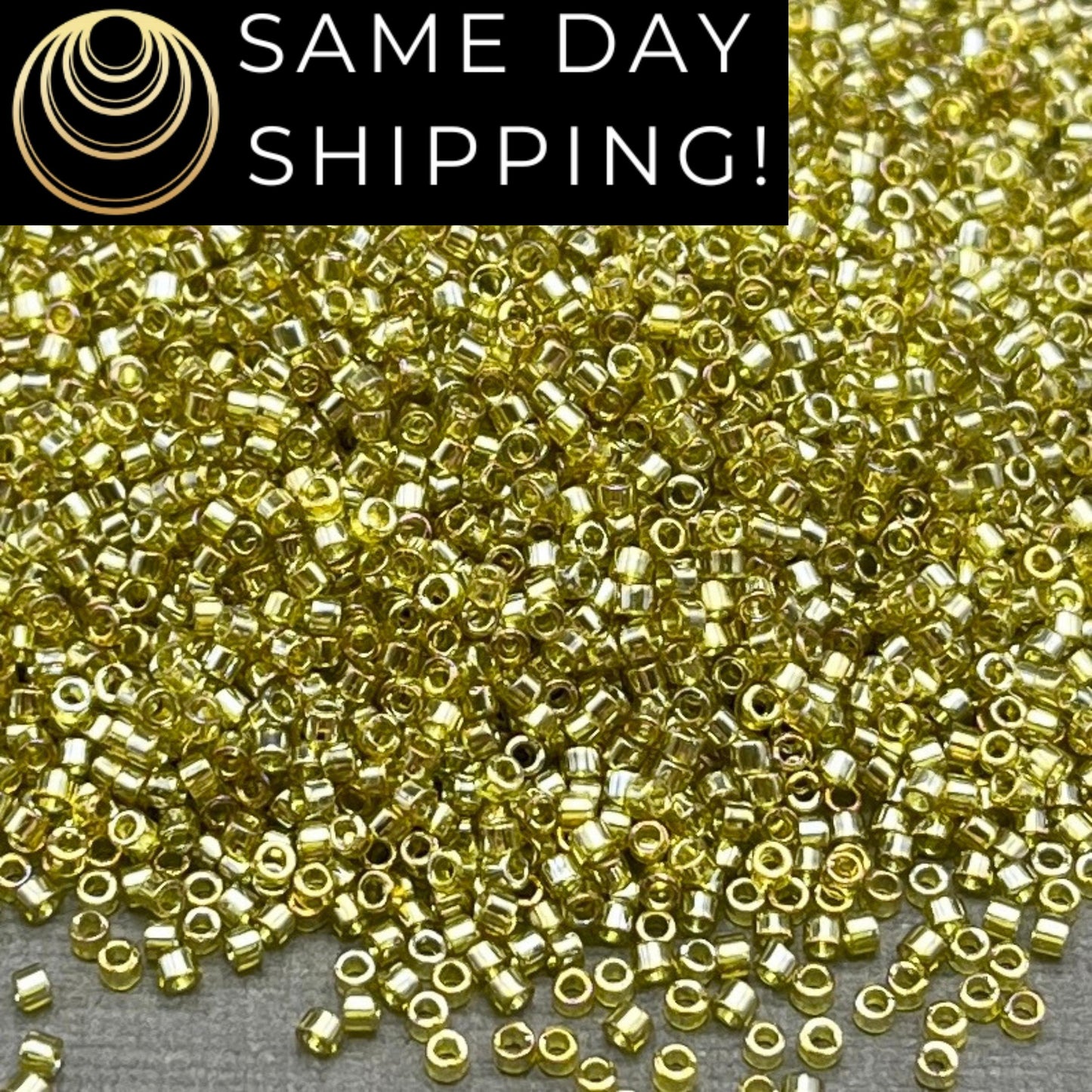 DB0124 11/0 Miyuki Delica Beads Transparent Golden Olive Luster