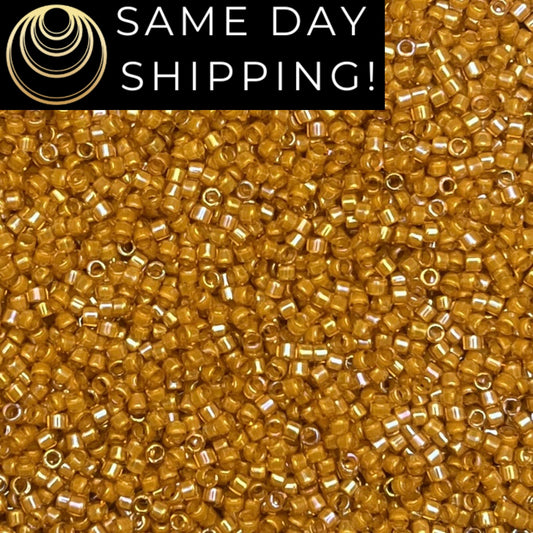DB0272 11/0 Miyuki Delica Beads Goldenrod Lined Topaz AB