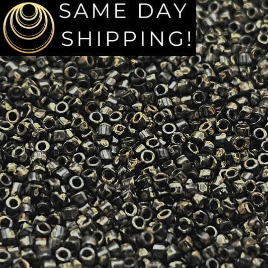 DB2261 11/0 Miyuki Delica Beads Black Picasso