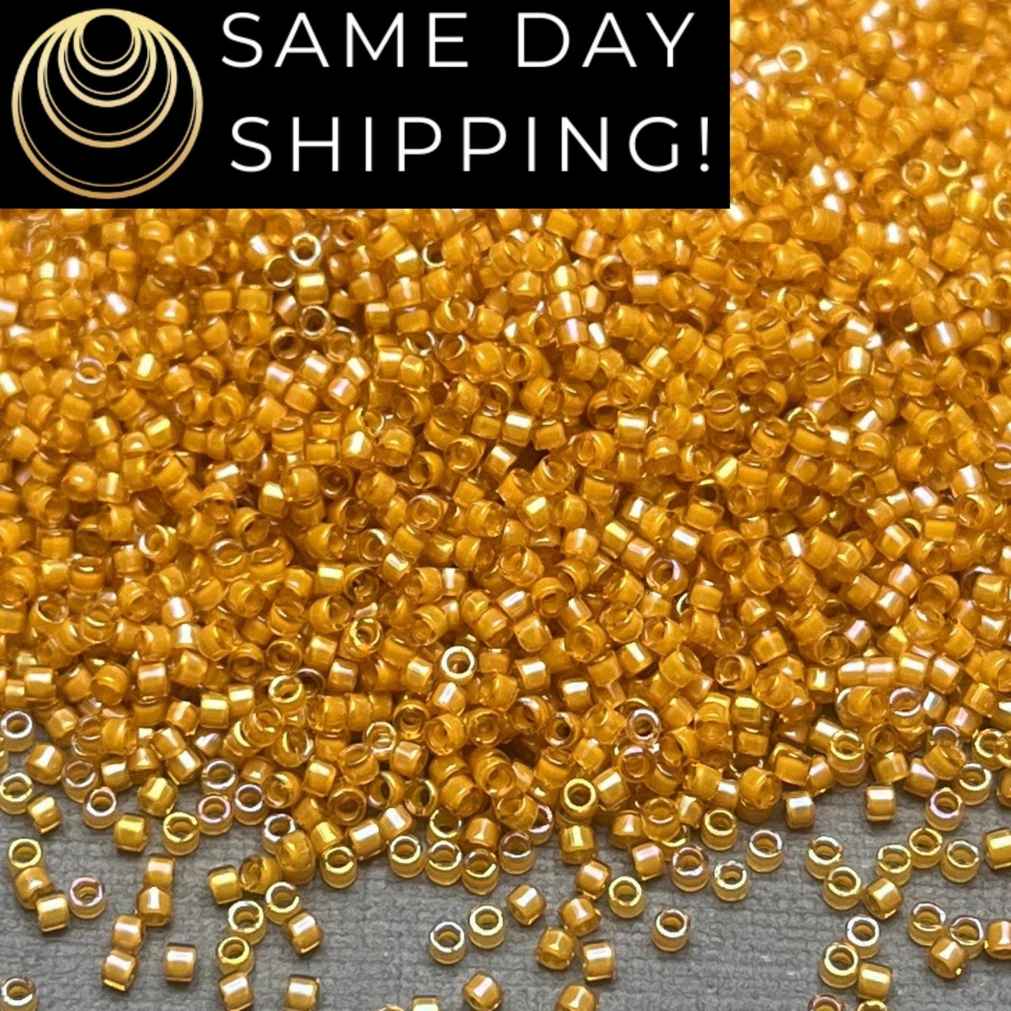 DB0272 11/0 Miyuki Delica Beads Goldenrod Lined Topaz AB