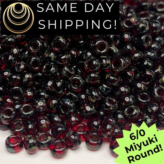 6-4504 Miyuki 6/0 Round Beads, Transparent Garnet Red Picasso