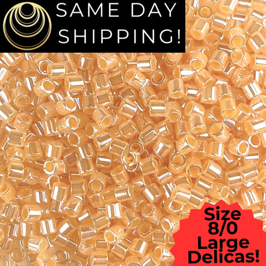 DBL0233 8/0 LARGE Miyuki Pale Orange Lined Crystal Lstr 6.8g Tube