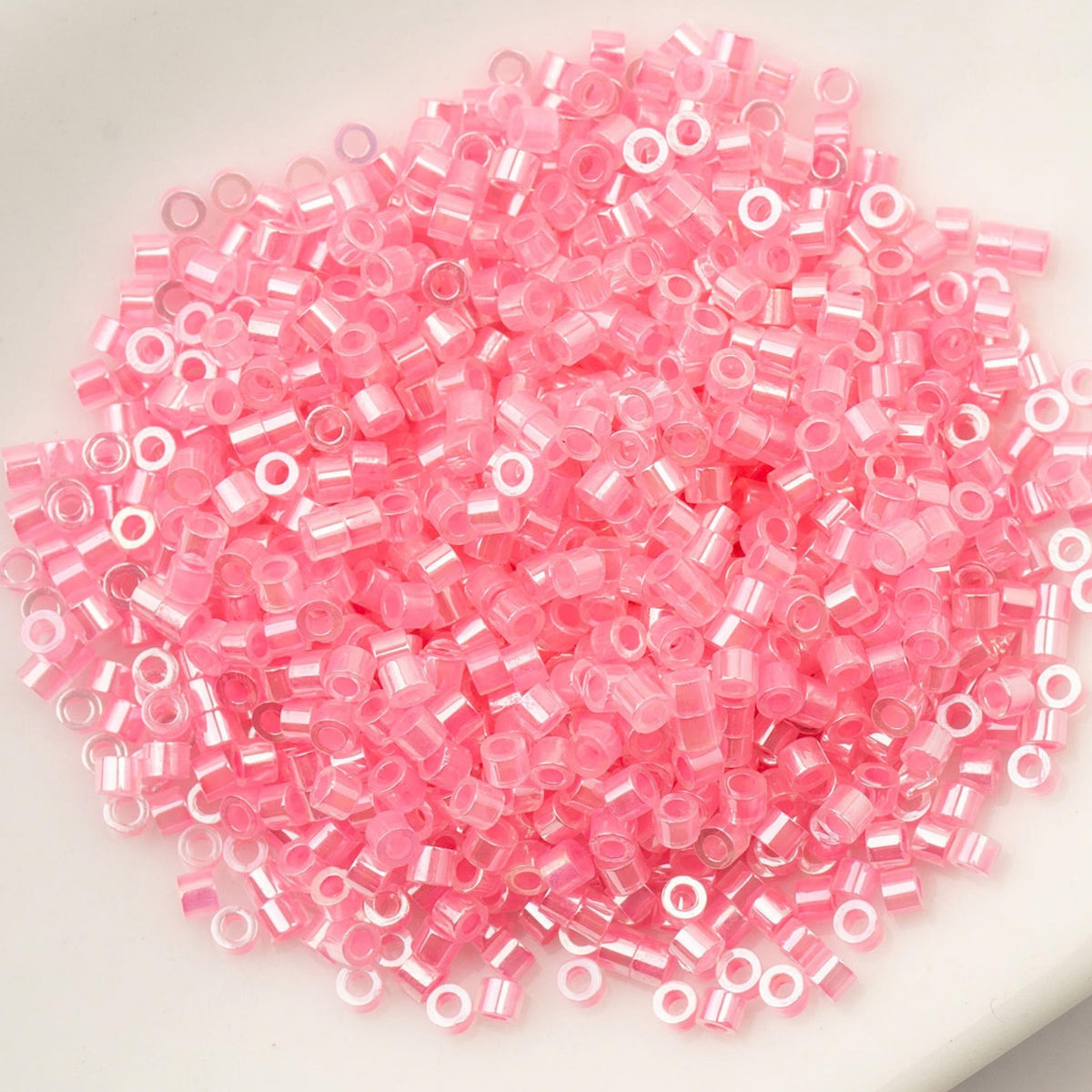 CY11-1032 11/0 Cylin Beads Crystal Dark Pink Lined Ceylon