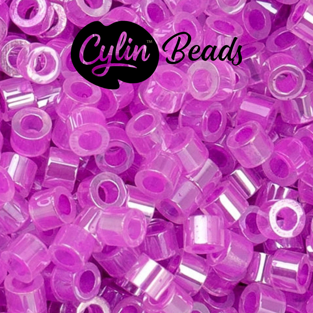 CY11-1033 11/0 Cylin Beads Crystal Fuchsia Lined Ceylon