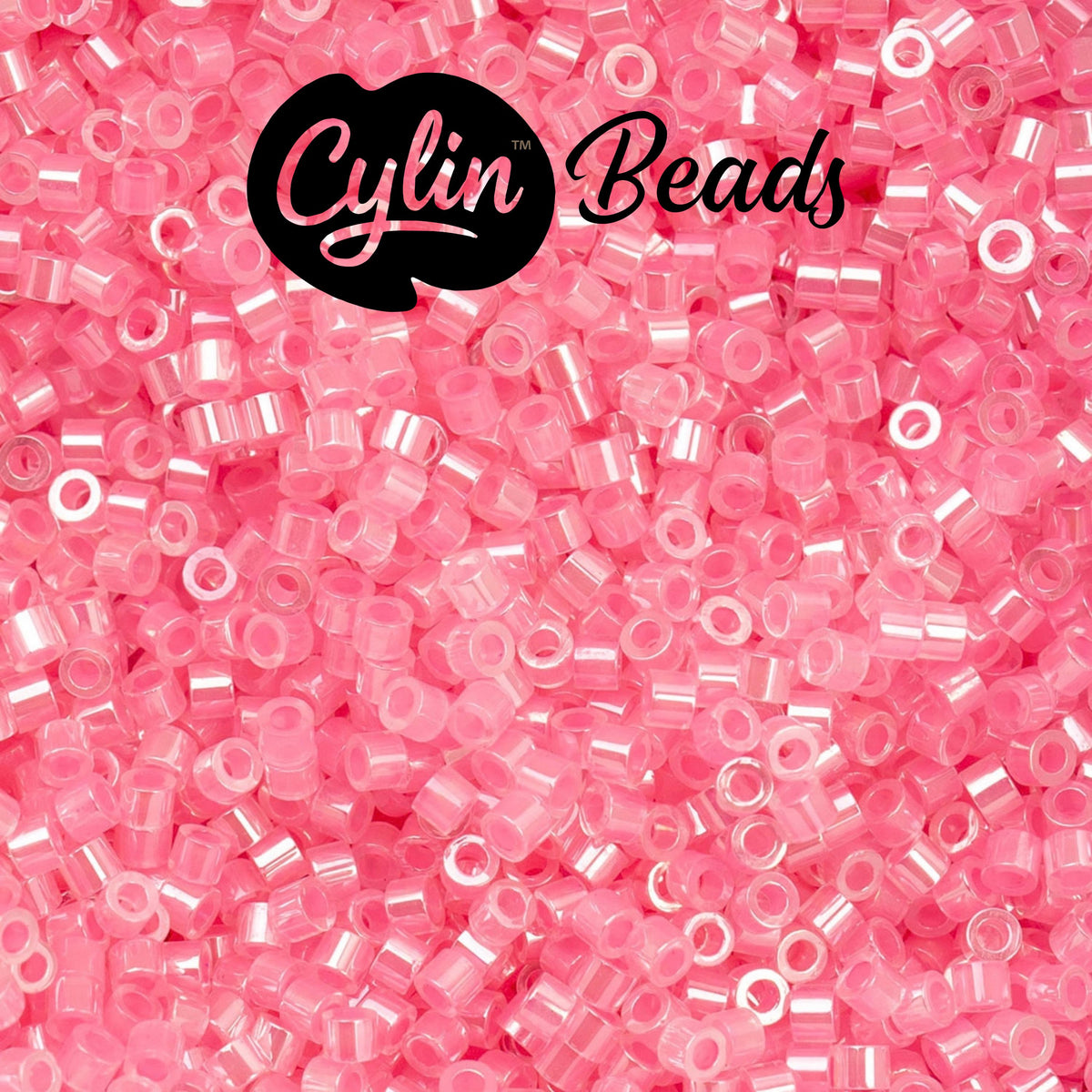 CY11-1032 11/0 Cylin Beads Crystal Dark Pink Lined Ceylon