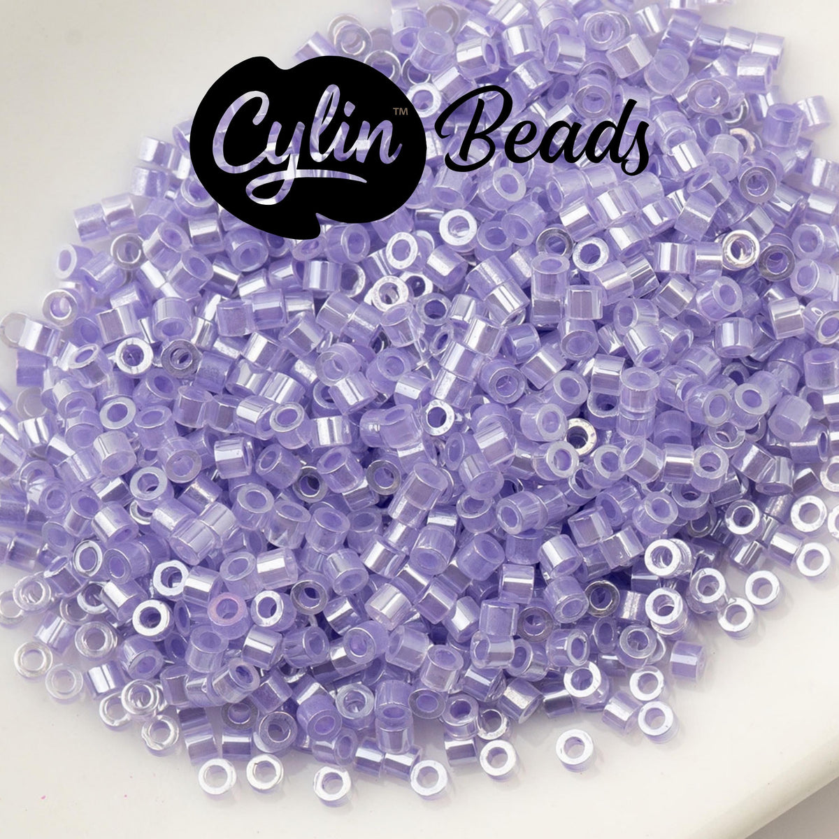 CY11-1034 11/0 Cylin Beads Crystal Purple Lined Ceylon