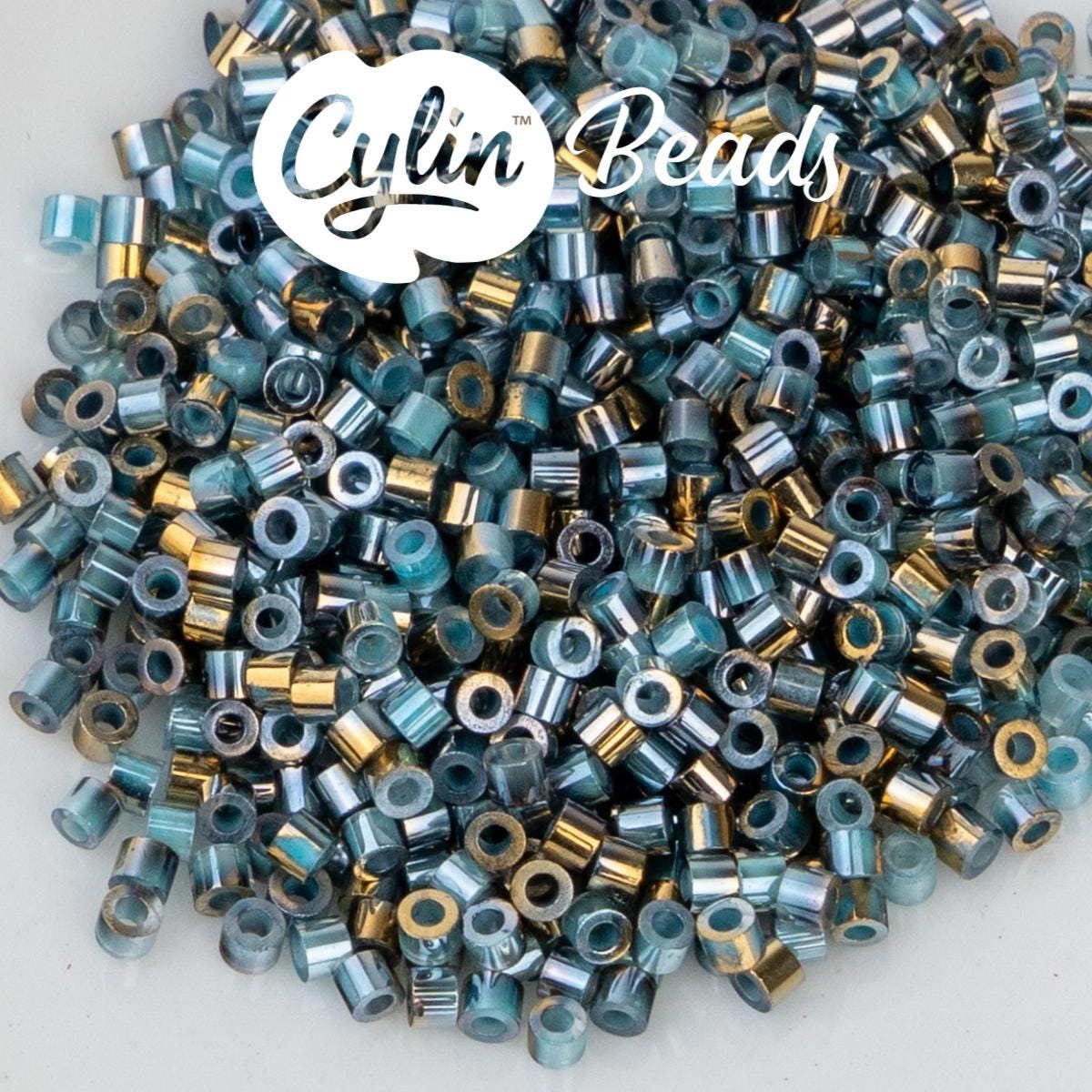 CY11-1235 11/0 Cylin Beads Gilded Halo Crystal Aqua