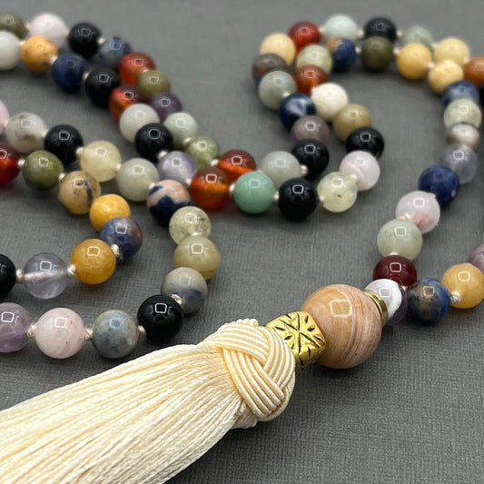 Hand Knotted Mixed Gemstone Mala Necklace with Gold Accents and Cream Tassel